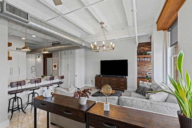 221 W Lancaster Ave Unit 4012, Fort Worth, TX 76102 - living room featuring a chandelier and baseboards