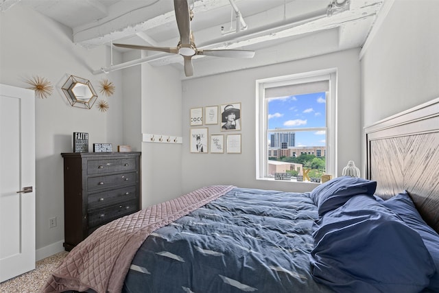 221 W Lancaster Ave Unit 4012, Fort Worth, TX 76102 - bedroom featuring baseboards and ceiling fan