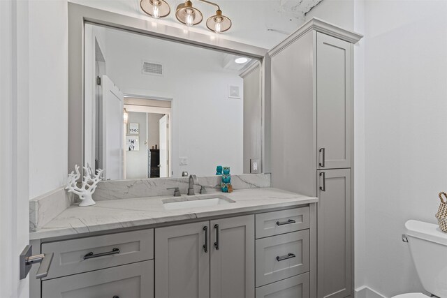 221 W Lancaster Ave Unit 4012, Fort Worth, TX 76102 - bathroom featuring vanity and toilet