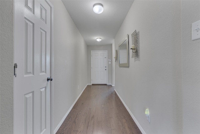2208 Heaton St, Forney, TX 75126 - hall featuring dark wood-style floors and baseboards