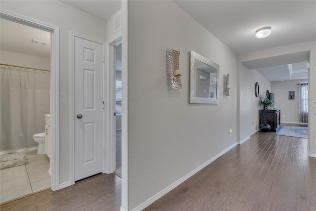 2208 Heaton St, Forney, TX 75126 - hall with wood finished floors and baseboards