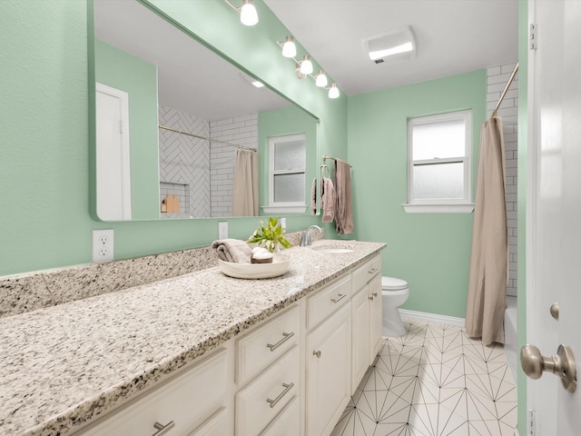 full bath with toilet, vanity, baseboards, tile patterned floors, and shower / bathtub combination with curtain