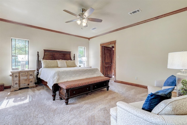 bedroom featuring carpet floors, multiple windows, baseboards, crown molding, and ceiling fan