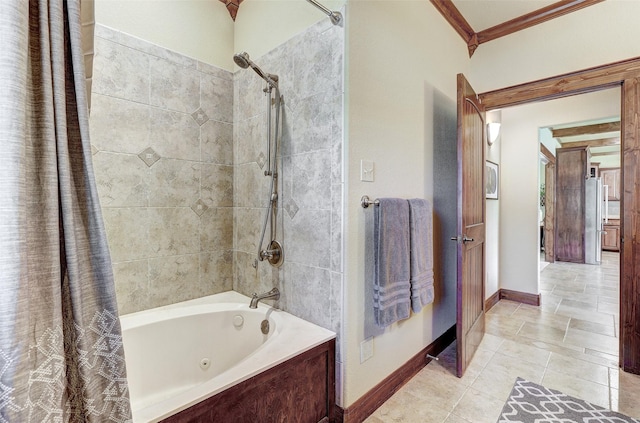 full bath featuring shower / bath combo, baseboards, crown molding, and tile patterned flooring