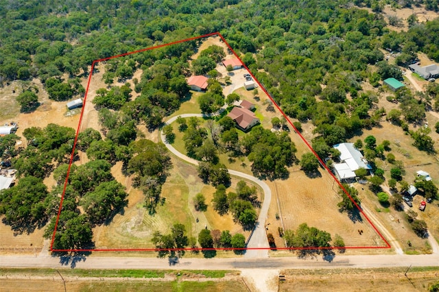 aerial view of property and surrounding area featuring property boundaries highlighted
