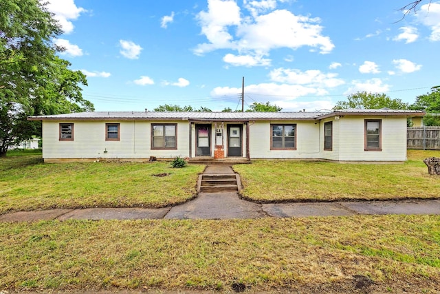 64 Pershing Dr Unit A & B, Denison, TX 75020 - ranch-style house featuring metal roof