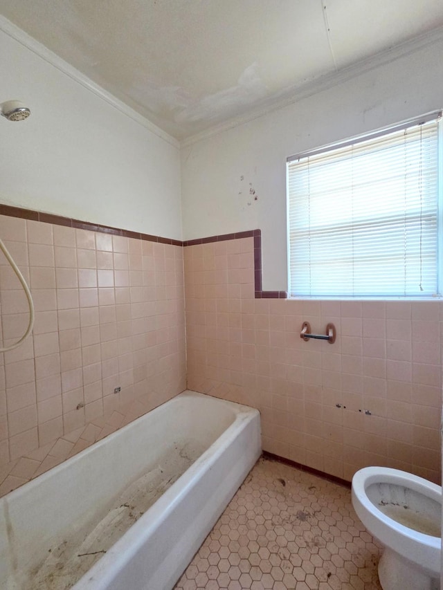 64 Pershing Dr Unit A & B, Denison, TX 75020 - bathroom featuring ornamental molding, a bath, tile walls, and tile patterned floors