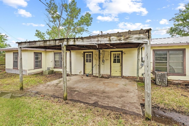 64 Pershing Dr Unit A & B, Denison, TX 75020 - single story home featuring a patio and cooling unit
