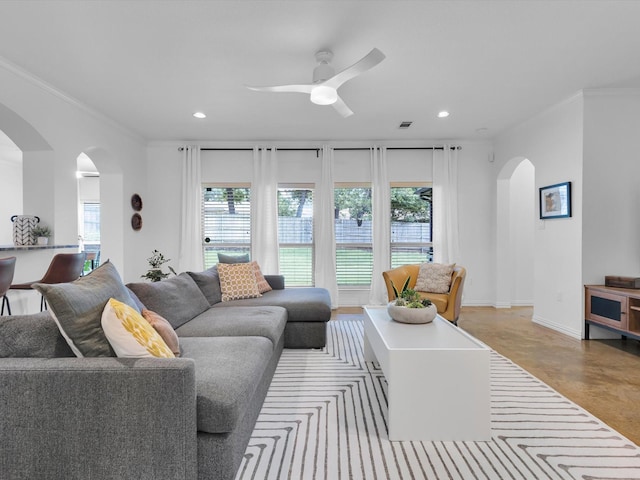 1806 Briarcrest Ln, Arlington, TX 76012 - living room featuring arched walkways, healthy amount of natural light, recessed lighting, ceiling fan, and crown molding