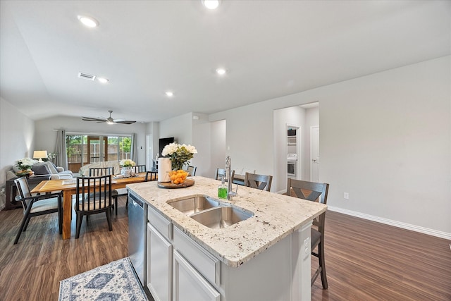 252 Rosewood Dr, Lavon, TX 75166 - kitchen with a sink, stainless steel dishwasher, open floor plan, a center island with sink, and a kitchen bar