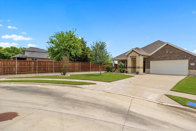 252 Rosewood Dr, Lavon, TX 75166 - view of front facade with brick siding, a garage, and driveway