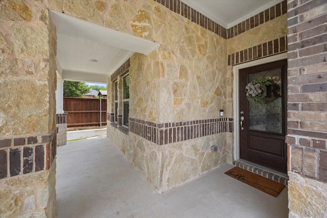 252 Rosewood Dr, Lavon, TX 75166 - entrance to property featuring stone siding and a porch