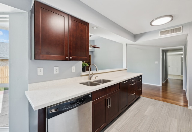 2848 Oxford Ln, Flower Mound, TX 75028 - kitchen with a sink, dishwasher, light countertops, and baseboards