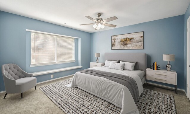 2848 Oxford Ln, Flower Mound, TX 75028 - carpeted bedroom with baseboards and a ceiling fan