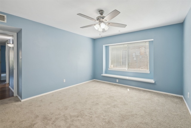 2848 Oxford Ln, Flower Mound, TX 75028 - spare room with carpet flooring, a ceiling fan, and baseboards