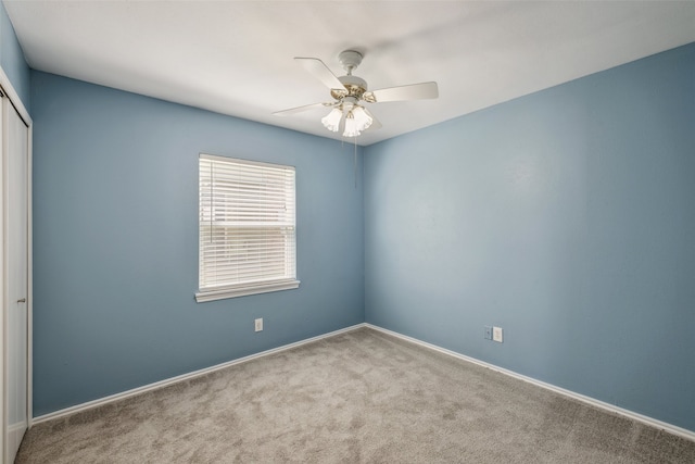 2848 Oxford Ln, Flower Mound, TX 75028 - carpeted empty room with baseboards and a ceiling fan