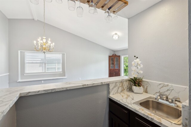 2848 Oxford Ln, Flower Mound, TX 75028 - bathroom featuring lofted ceiling, a chandelier, and vanity