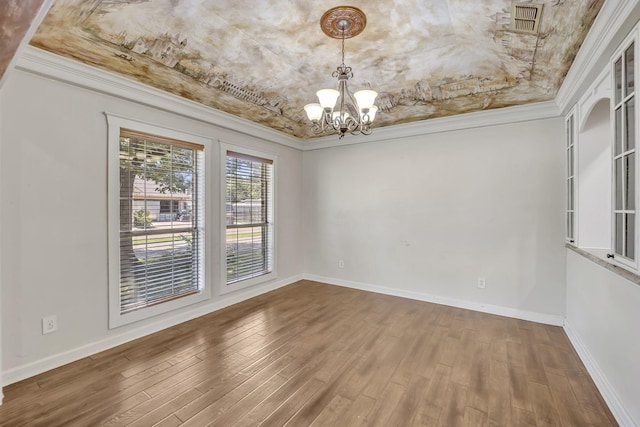 1700 Tall Timber Dr, Tyler, TX 75703 - unfurnished room featuring ornamental molding, a chandelier, wood finished floors, and baseboards