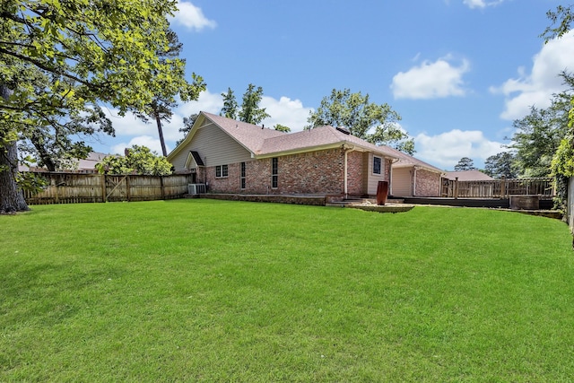 1700 Tall Timber Dr, Tyler, TX 75703 - back of property with brick siding and central air condition unit