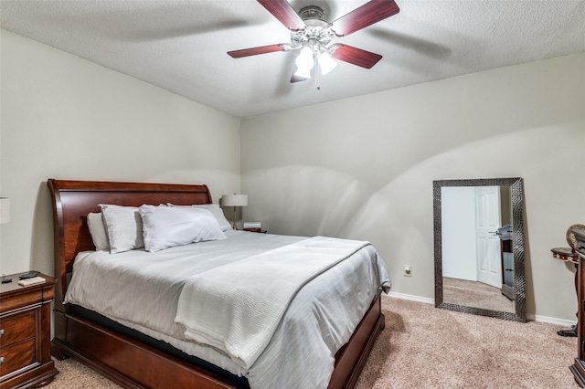 109 Tuscany Ct, Irving, TX 75062 - bedroom with light carpet, ceiling fan, and a textured ceiling