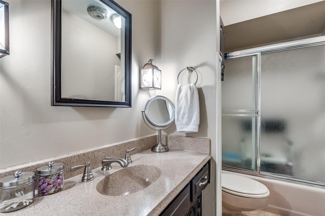 109 Tuscany Ct, Irving, TX 75062 - full bathroom with toilet, combined bath / shower with glass door, and vanity
