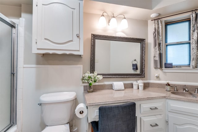 109 Tuscany Ct, Irving, TX 75062 - bathroom with a shower with shower door, toilet, and vanity