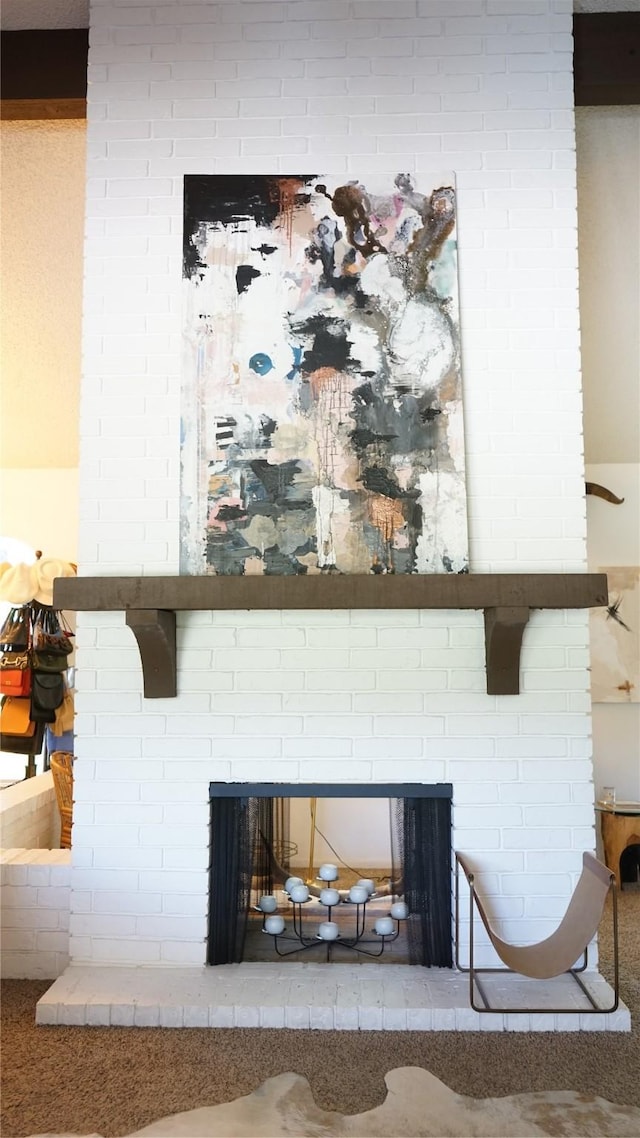 7640 Skylake Dr, Fort Worth, TX 76179 - detailed view of a brick fireplace and carpet floors