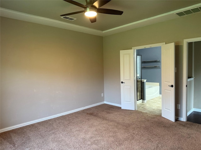 3400 Glen Crest Ln, Denton, TX 76208 - unfurnished bedroom featuring carpet flooring, baseboards, a spacious closet, and a ceiling fan