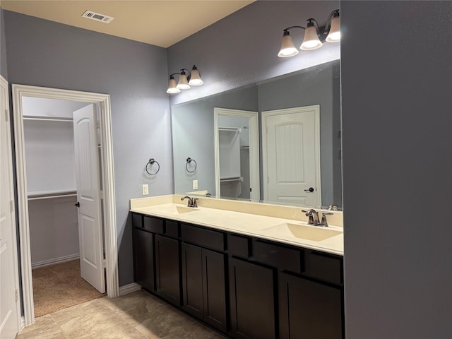 3400 Glen Crest Ln, Denton, TX 76208 - full bath featuring a walk in closet and double vanity