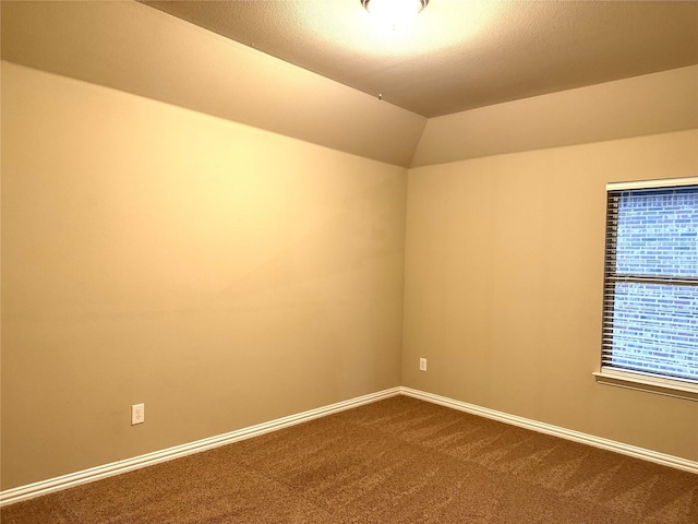 3400 Glen Crest Ln, Denton, TX 76208 - empty room featuring dark carpet and baseboards