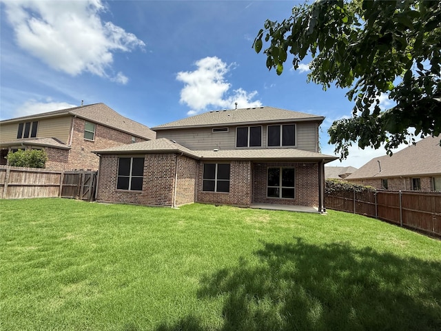 3400 Glen Crest Ln, Denton, TX 76208 - back of property featuring brick siding and roof with shingles