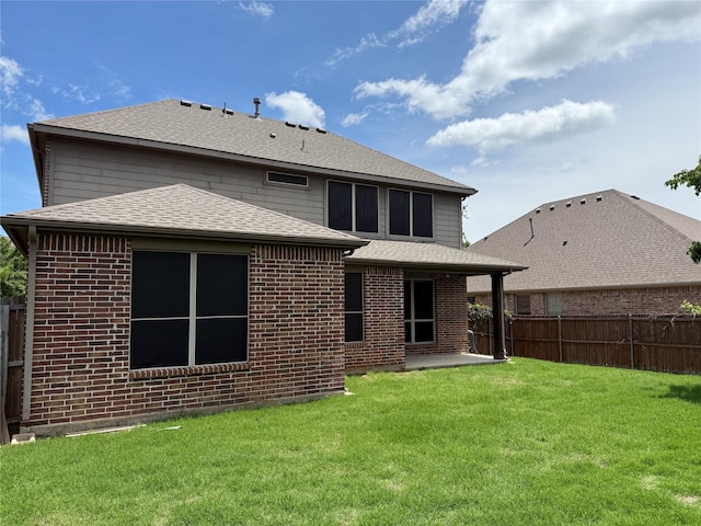 3400 Glen Crest Ln, Denton, TX 76208 - rear view of property with a patio area, brick siding, and a shingled roof
