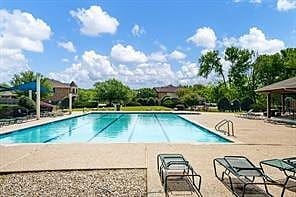 3400 Glen Crest Ln, Denton, TX 76208 - community pool featuring a patio