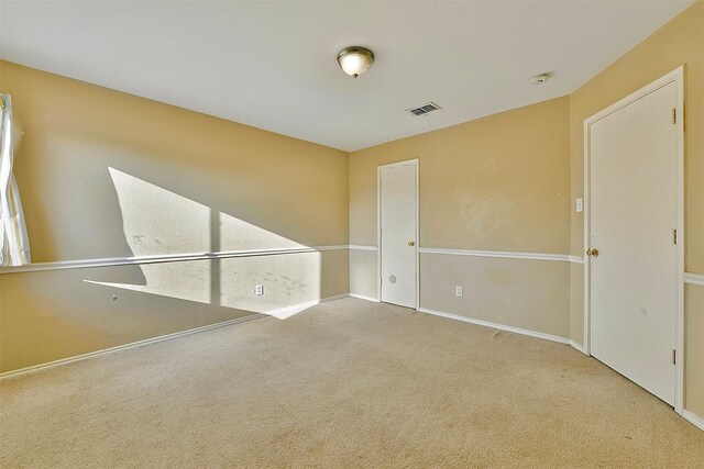 6917 Tessla Dr, Dallas, TX 75241 - spare room featuring carpet floors, baseboards, and a smoke detector