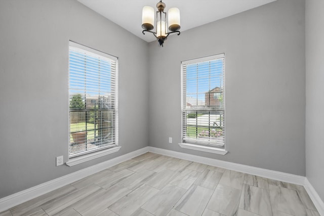 10825 Thorngrove Ct, Fort Worth, TX 76052 - unfurnished room featuring a chandelier, healthy amount of natural light, and baseboards