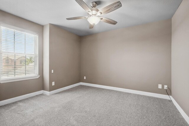 10825 Thorngrove Ct, Fort Worth, TX 76052 - empty room featuring carpet flooring, ceiling fan, and baseboards