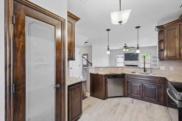 10825 Thorngrove Ct, Fort Worth, TX 76052 - kitchen featuring stainless steel appliances, a ceiling fan, a sink, decorative backsplash, and dark brown cabinets