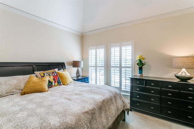 bedroom with crown molding and a high ceiling