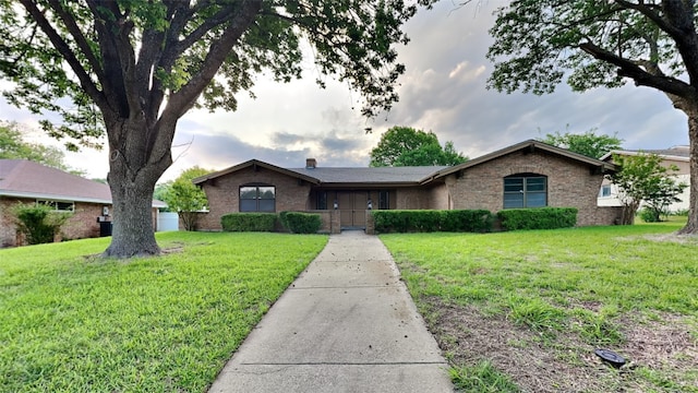 108 Meadowcrest Dr, Desoto, TX 75115 - ranch-style house featuring brick siding and a front lawn