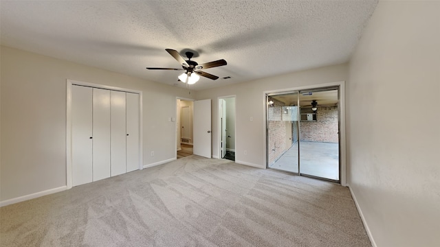 108 Meadowcrest Dr, Desoto, TX 75115 - unfurnished bedroom with carpet flooring, baseboards, a textured ceiling, and ceiling fan