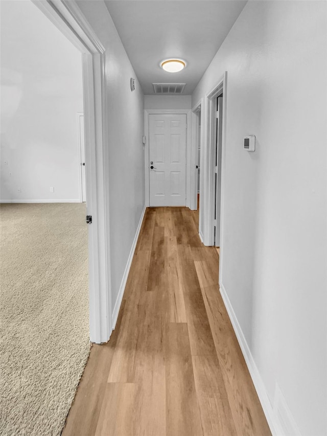 2303 Ox Bow Ct, Arlington, TX 76006 - corridor with light wood-type flooring and baseboards