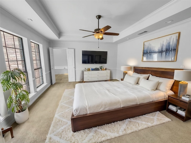 2303 Ox Bow Ct, Arlington, TX 76006 - bedroom featuring a tray ceiling, carpet floors, ornamental molding, and a ceiling fan