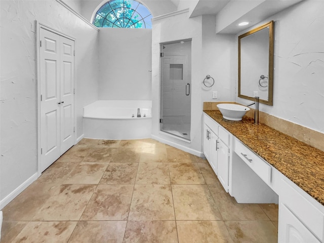 2303 Ox Bow Ct, Arlington, TX 76006 - full bathroom featuring a shower stall, vanity, a garden tub, and tile patterned floors