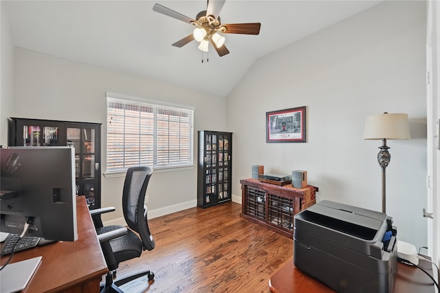 office with wood finished floors, ceiling fan, lofted ceiling, and baseboards
