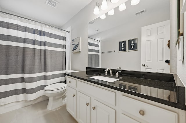 full bathroom featuring tile patterned flooring, toilet, vanity, and curtained shower