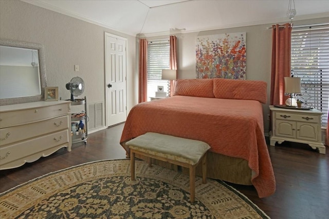 228 Mccarley Pl, Mckinney, TX 75071 - bedroom featuring dark wood-style floors, vaulted ceiling, crown molding, and a textured wall