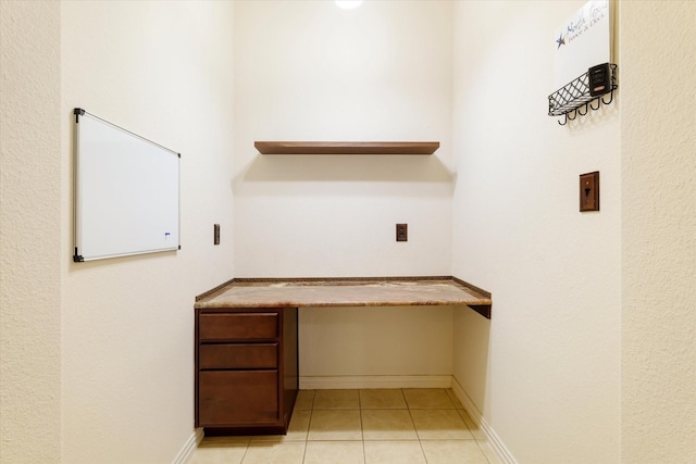505 Osage Dr, Mckinney, TX 75071 - unfurnished office featuring built in study area, light tile patterned flooring, and baseboards