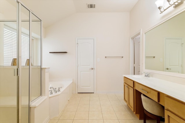 505 Osage Dr, Mckinney, TX 75071 - full bathroom with vanity, a bath, lofted ceiling, tile patterned flooring, and baseboards