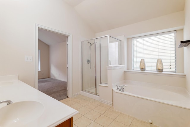 505 Osage Dr, Mckinney, TX 75071 - bathroom with a garden tub, a stall shower, double vanity, tile patterned flooring, and lofted ceiling