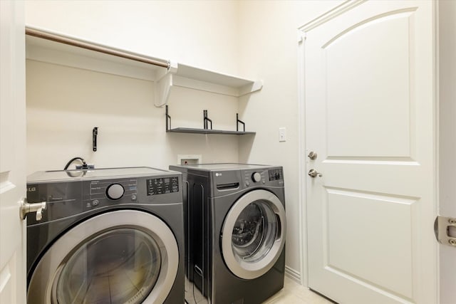 505 Osage Dr, Mckinney, TX 75071 - laundry area with separate washer and dryer and light tile patterned flooring